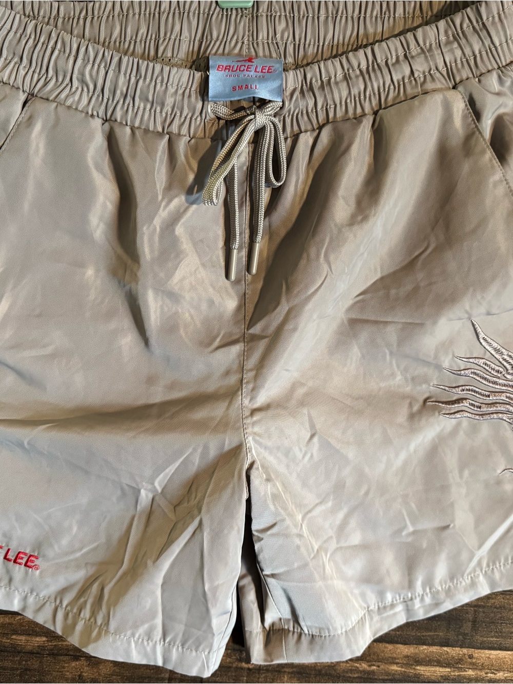 Bruce Lee S Tan Men's Swim Board Shorts — Embroidered Detailing and Drawstring